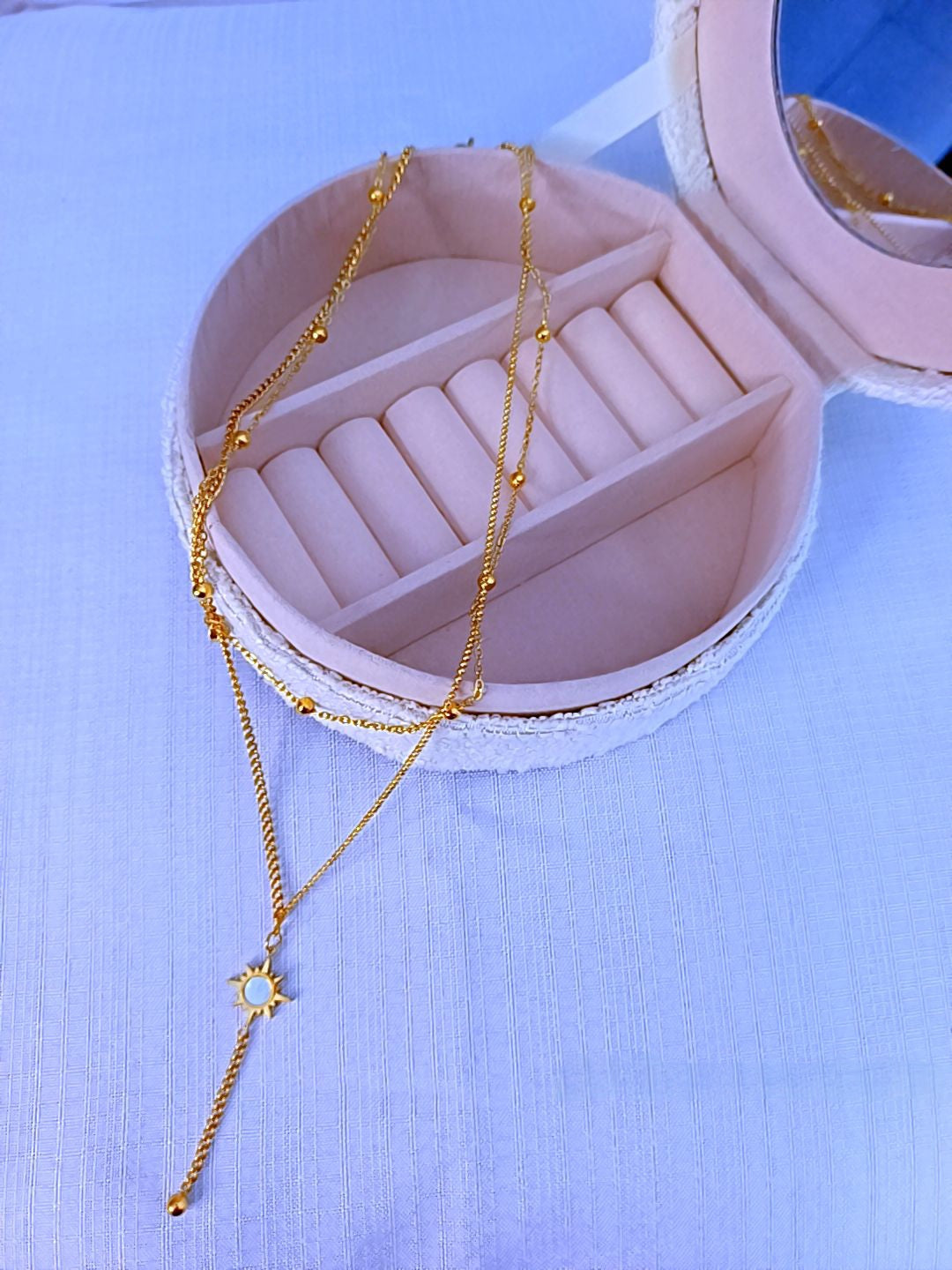 Collier soleil en acier inoxydable.